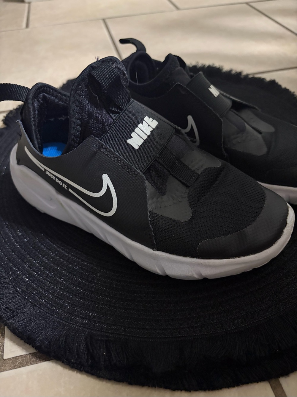 Nike Kids Black and White Slip-On Sneaker with Swoosh
